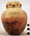 Jar, human face at neck