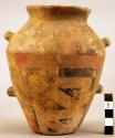 Jar with two perforated ears upon either side