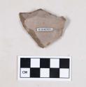 Chipped stone, flint uniface, possible point