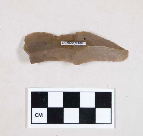 Chipped stone, flint blade; two fragments crossmended with glue