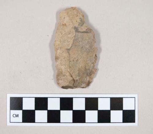 Chipped stone, flint uniface, with possible serrated edge