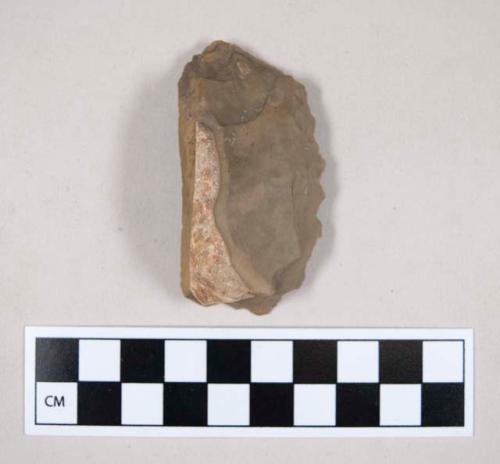 Chipped stone, flint uniface, with cortex, serrated