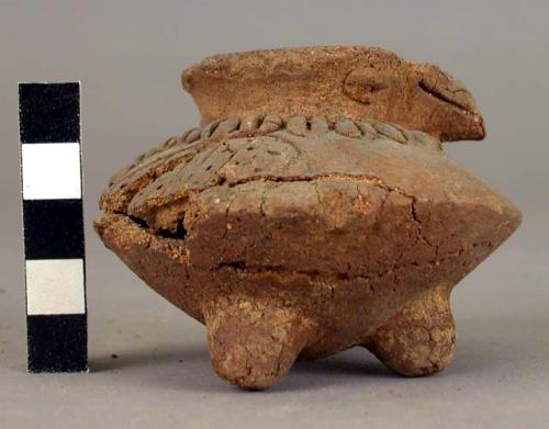 Small round pottery jar, 3 legs, lugs on the side