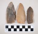 Chipped stone, flint blades, some with retouching or use wear, one with cortex