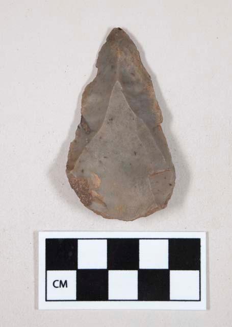 Chipped stone, flint edged tool, with notch