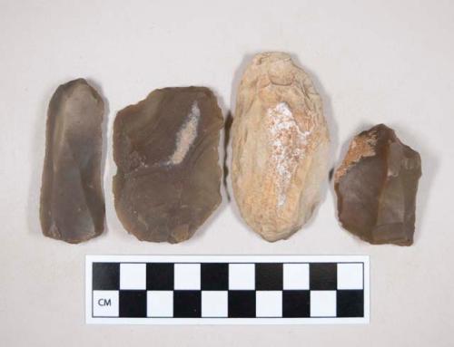 Chipped stone, flint scrapers, some with cortex