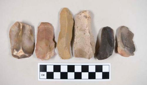 Chipped stone, flint scrapers, some with cortex