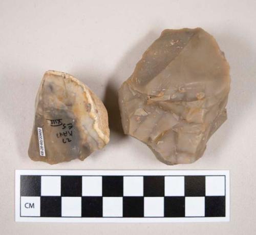 Chipped stone, flint cores, with retouching or use wear, one with cortex