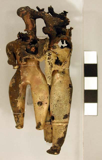 Portions of gold pendant - human figures