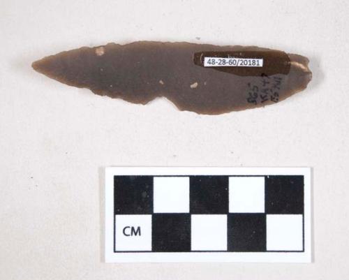 Chipped stone, flint blade, with possible notch