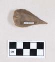 Chipped stone, flint uniface, possible drill or perforator