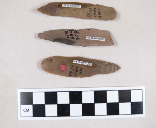 Chipped stone, flint edged tools, blades worked into points