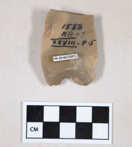 Chipped stone, flint blade, with possible notch at one end