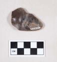 Chipped stone, flint flake, with possible retouching or use wear, with possible notch