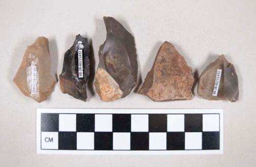 Chipped stone, flint burins, some with cortex