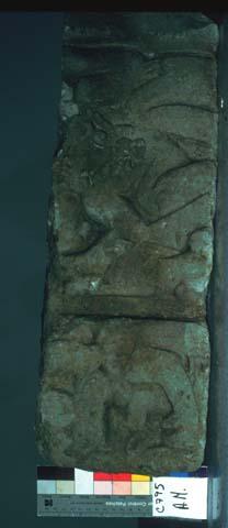 Sculptured block glyph, human fig.