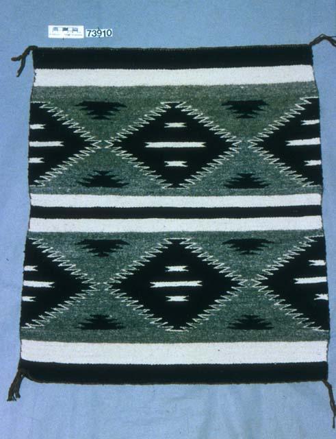 Banded saddle blanket or rug