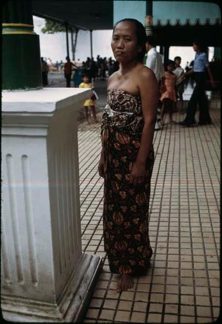 Woman in traditional dress at Palace