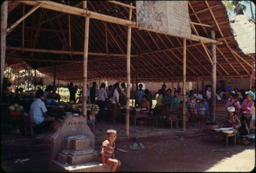 Group of people under structure