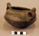 Double handled wide mouthed vessel