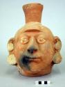 Ceramic bottle, human figure