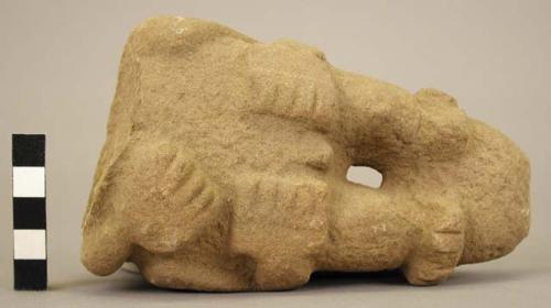 Fragment of stone figurine