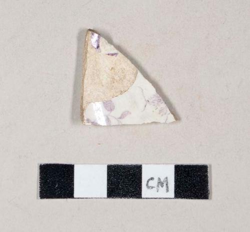 Purple transfer printed whiteware base sherd