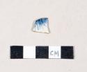 Blue shell edged pearlware rim sherd