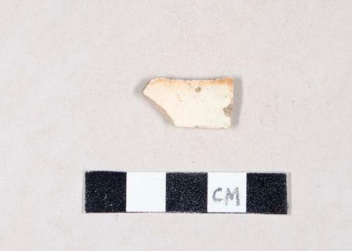 Orange lusterware body sherd