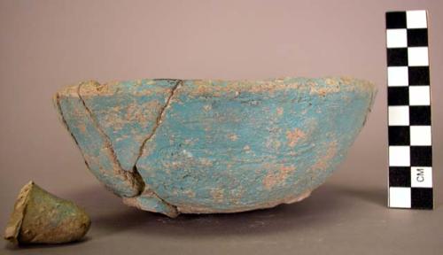 Ceramic bowl, remnants of 3 feet, rounded base and sides, straight rim