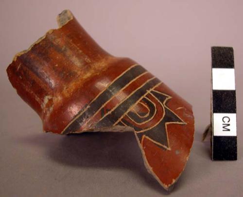 10 potsherds- black on red with incised lines around black- Type IIh