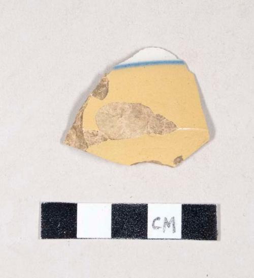 Factory decorated blue and white yellowware body sherd