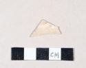 Undecorated and unglazed refined earthenware body sherd