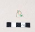 Green glazed refined earthenware rim sherd with scalloped edge