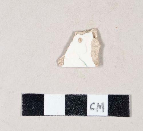 Green hand painted whiteware body sherd