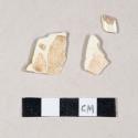 Undecorated creamware body sherds; two sherds crossmend