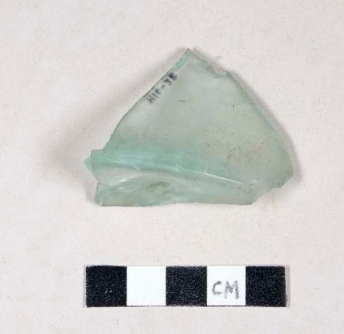 Aqua bottle glass base fragment with impressed circle in base