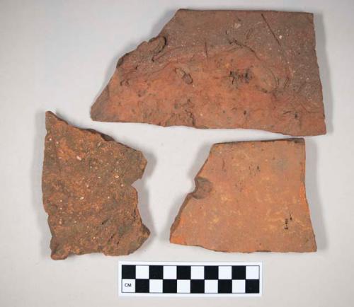 Redware roof tile fragments, 2 with possible nail holes