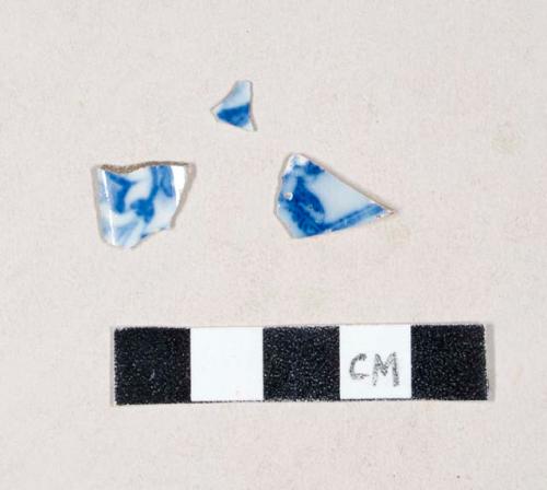 Blue hand painted pearlware body sherds; two sherds crossmend