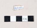 Blue transfer printed whiteware rim sherd