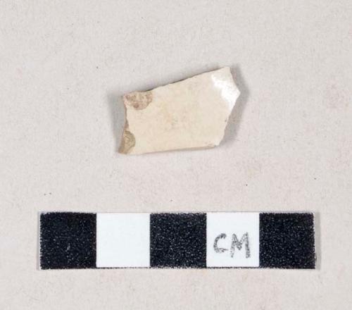 Buff bodied, buff glazed stoneware body sherd