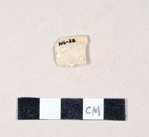 Orange lusterware body sherd