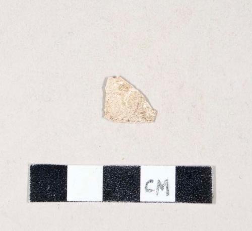 Unglazed and undecorated refined earthenware body sherd