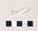 White plastic utensil fragment