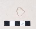 White salt glaze stoneware rim sherd with molded lines around rim