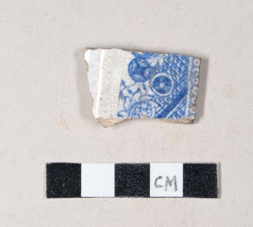 Blue transfer printed whiteware rim sherd