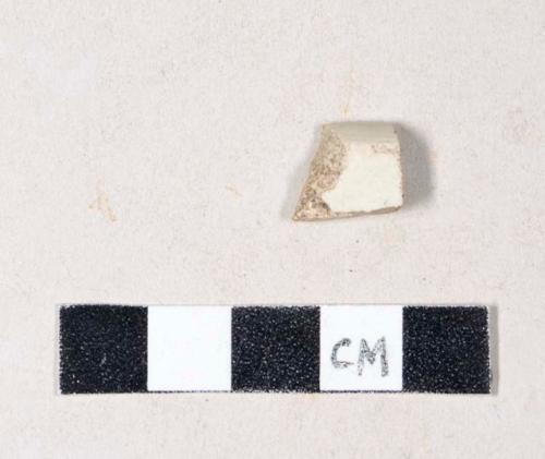 White salt glaze stoneware rim sherd with molded barley pattern