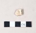 Undecorated creamware body sherd, with attached molded handle