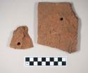 Redware roof tile fragments, with nail holes