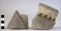 2 potsherds - coarse domestic ware with plastique finger and nail indented band